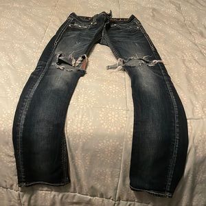 Rock revival distressed boot cut jeans